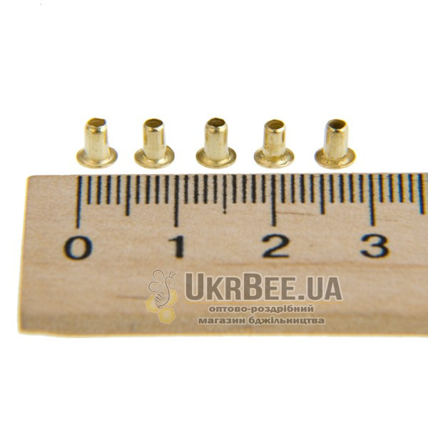 Side eyelets for bee frames 1 kg / 11000 pcs 2.5 mm x 4 mm (copper-plated iron)