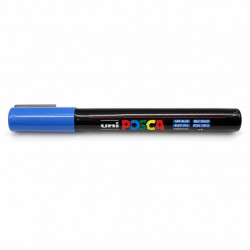 Blue uni POSCA marker lying horizontally on white background