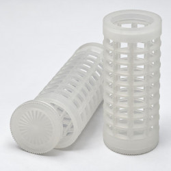 Close-up of two translucent Jenter cages on a light gray background
