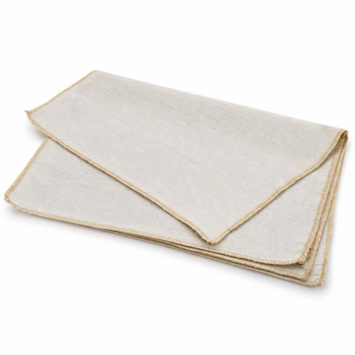 Stack of folded beige hive cover cloths on a white background