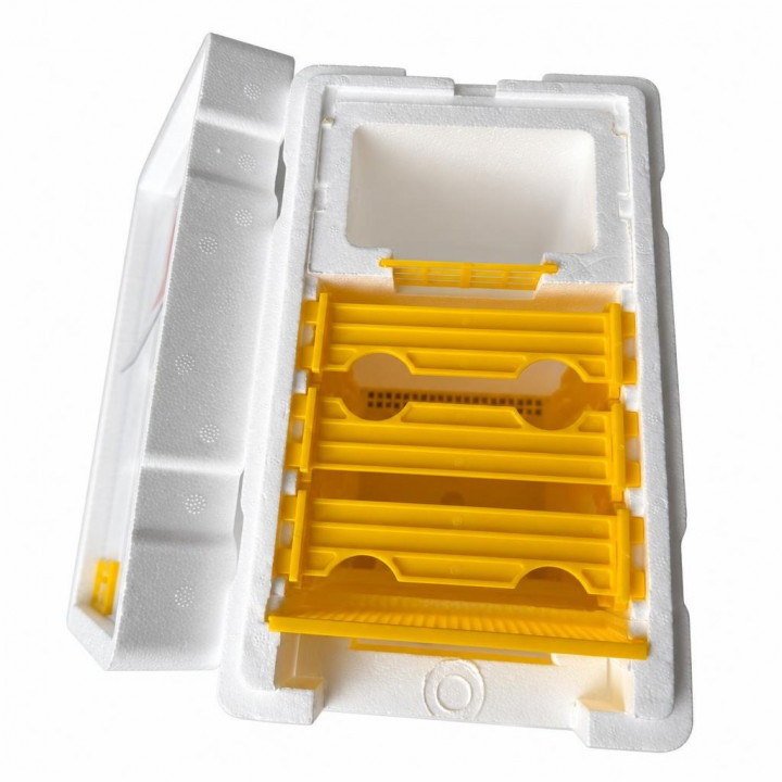 Top view of an open EPS mini nuc with yellow frames and lid to the side